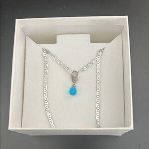 Elegant Silver Necklace with Blue Pendant